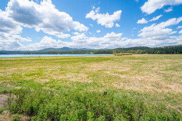 Fototapeta na wymiar The wide marshland and lake at McKenzie Conservation Area in Newman Lake, Washington, USA