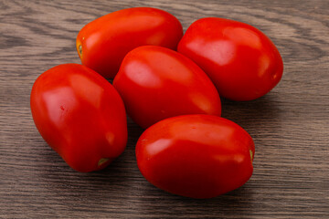 Red bright tasty tomato heap