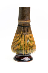 Japanese green tea matcha Chasen bamboo whisk isolated in white background. © Anusorn