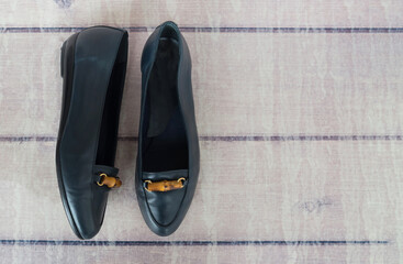 womens shoes on low on a wooden background. Copy space. Place for your text.