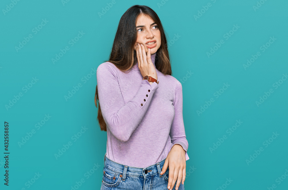 Poster Young beautiful teen girl wearing turtleneck sweater touching mouth with hand with painful expression because of toothache or dental illness on teeth. dentist