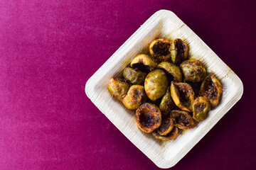 Tasty Goonda or Gunde ki sabzi also known as Gumberry or glue berry vegetable home cooked with Indian masala. Seasonal sabji fruit side dish eaten with chapati or rice. Also known as Lasoda or lasura