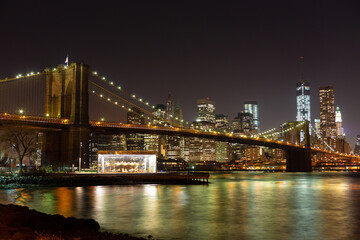 Fototapeta na wymiar Brooklyn Bridge from Brooklyn to Manhattan at night, New York, USA.
