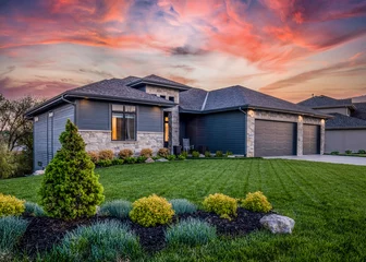 Printed roller blinds Salmon Luxury home during twilight golden hour with pink and purple sky and lush landscaping in Nebraska USA