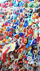 Fototapeta premium Colored rosettes for equestrian competitions in a small town in Sardinia in Italy. Digital watercolors