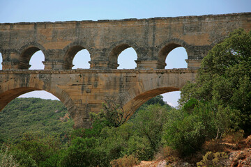 Pont du Gard, Gard, Occitanie, France: Roman aqueduct over Gardon river: close-up detail of upper tiers of arches
