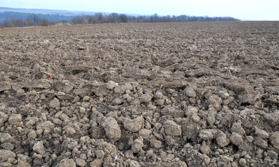 Plowing autumn field
