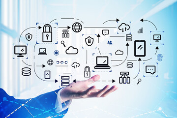 Businessman hand in suit holding drawn flowchart with network circuit icons. Global communication concept of technology and cyber security. Blurred office