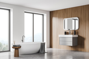 Fototapeta na wymiar White and wooden bathroom interior with sink and mirror, bathtub near window
