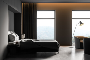 Dark bedroom interior with bed with armchairs on concrete floor near window