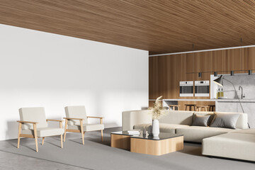 Interior of modern kitchen with wooden ceiling, furniture, table and chairs, big couch in the middle of living room space. Home architecture concept. Copy space wall.