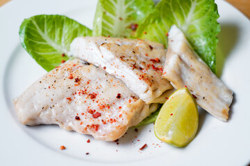Baked fish with herbs and lemon