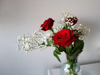 red roses in a glass vase