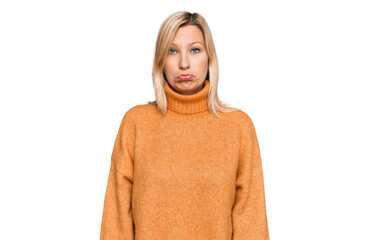 Middle age caucasian woman wearing casual winter sweater depressed and worry for distress, crying angry and afraid. sad expression.