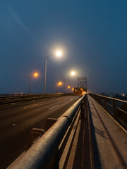 Dawn view of traffic driving across Ryde Bridge, Sydney, Australia.