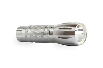 Metal flashlight on a white background. Isolate