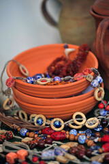 Obraz na płótnie Canvas ceramic bowls and beads on them