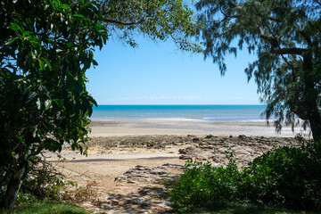 Casuarina Beach view through foliage, Darwin, Northern Territory, Australia.