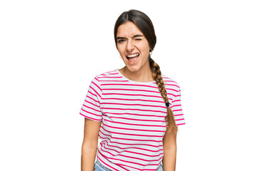 Young hispanic woman wearing casual clothes winking looking at the camera with sexy expression,...
