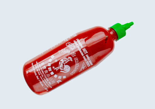 Calgary, Alberta Canada. May 7, 2021. A Sriracha Hot Souce Bottle A Type Of Hot Sauce Or Chili Sauce Made From A Paste Of Chili Peppers, Distilled Vinegar, Garlic, Sugar, And Salt.