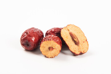 heap of dried chinese red dates isolated on the white background