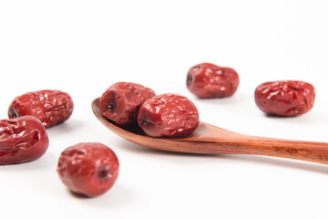 heap of dried chinese red dates isolated on the white background
