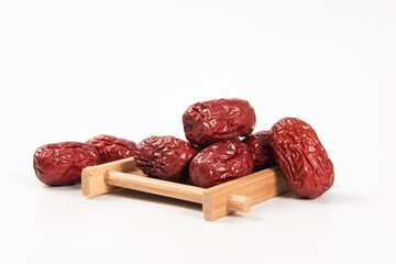 heap of dried chinese red dates isolated on the white background