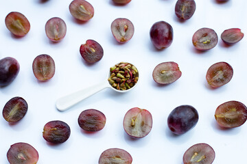 Fresh grape with seeds on white background