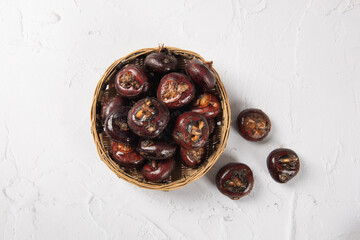 water chestnut fruit on table