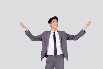 Portrait businessman in suit standing with win success isolated on white background, young asian business man is manager or executive having confident and excited is positive, expression and emotion.