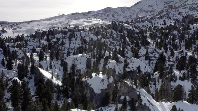 Aerial flight adove Alp Mountains and forest 
High mountain peaks sharp cliffs Dolomites, Italy
Drone view  from Italy Top Peaks 

