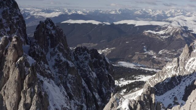 Aerial flight adove stunning Alps Cliffs. 
High mountain peaks sharp cliffs Dolomites, Italy
Drone view  from Italy Top Peaks 

