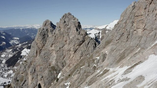 Aerial flight adove stunning Alps Cliffs. 
High mountain peaks sharp cliffs Dolomites, Italy
Drone view  from Italy Top Peaks 

