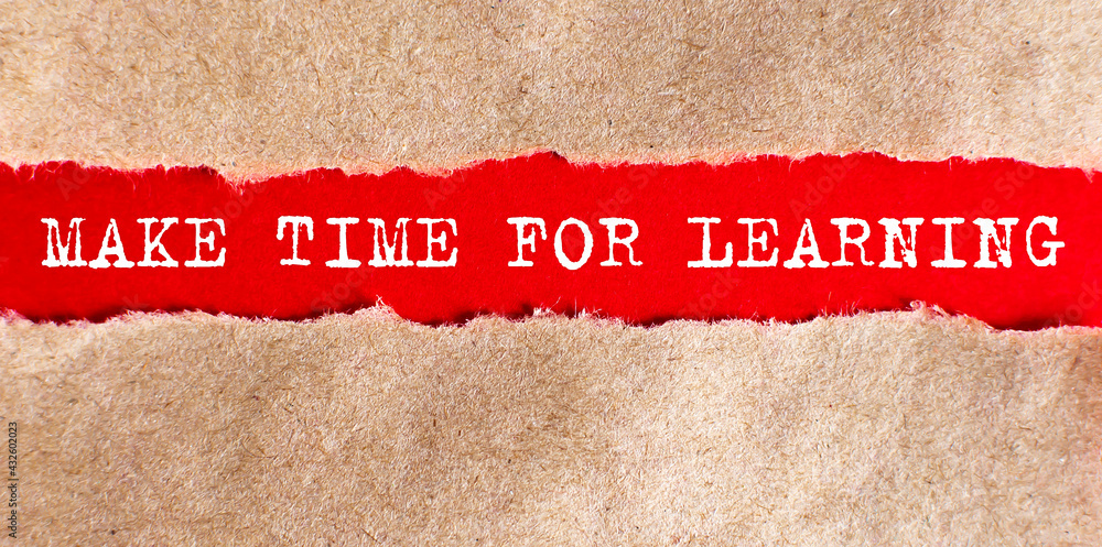 Poster make time for learning appearing behind on torn paper.