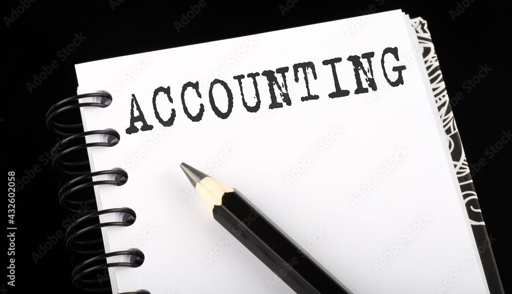 Poster accounting written text in small notebook on a black background