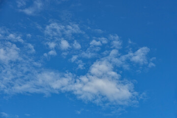 Beautiful white clouds on blue sky background.