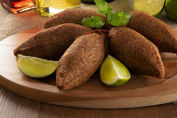 Kibbeh - Minced meat from the Middle East. Fried snack a typical Brazilian popular party dish (kibe)