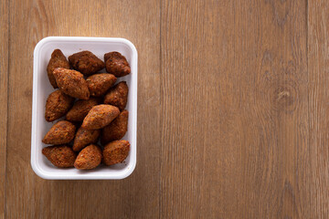 Kibbeh - Minced meat from the Middle East. Fried snack a typical Brazilian popular party dish (kibe). Top view