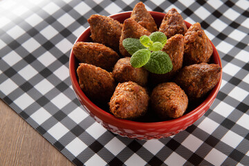 Kibbeh - Minced meat from the Middle East. Fried snack a typical Brazilian popular party dish (kibe)