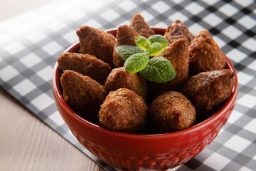 Kibbeh - Minced meat from the Middle East. Fried snack a typical Brazilian popular party dish (kibe)