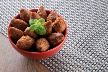 Kibbeh - Minced meat from the Middle East. Fried snack a typical Brazilian popular party dish (kibe)