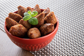 Kibbeh - Minced meat from the Middle East. Fried snack a typical Brazilian popular party dish (kibe)