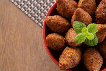 Kibbeh - Minced meat from the Middle East. Fried snack a typical Brazilian popular party dish (kibe). Top view