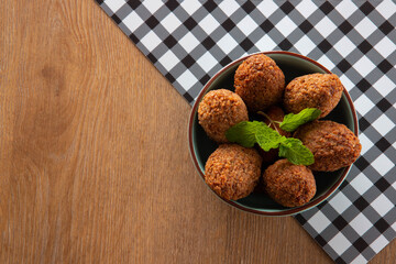 Kibbeh - Minced meat from the Middle East. Fried snack a typical Brazilian popular party dish (kibe). Top view