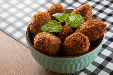 Kibbeh - Minced meat from the Middle East. Fried snack a typical Brazilian popular party dish (kibe)