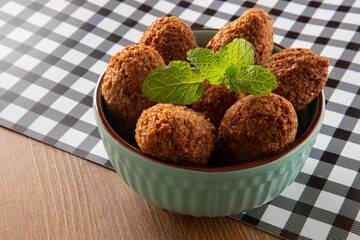 Kibbeh - Minced meat from the Middle East. Fried snack a typical Brazilian popular party dish (kibe)
