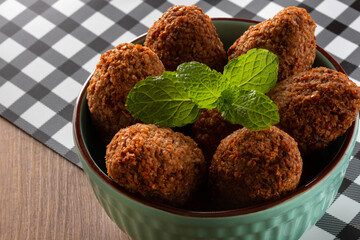 Kibbeh - Minced meat from the Middle East. Fried snack a typical Brazilian popular party dish (kibe)