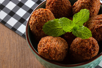 Kibbeh - Minced meat from the Middle East. Fried snack a typical Brazilian popular party dish (kibe)