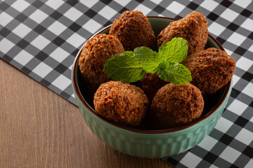 Kibbeh - Minced meat from the Middle East. Fried snack a typical Brazilian popular party dish (kibe)