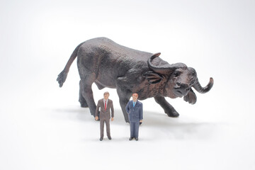 a figure with Bull Market at white background